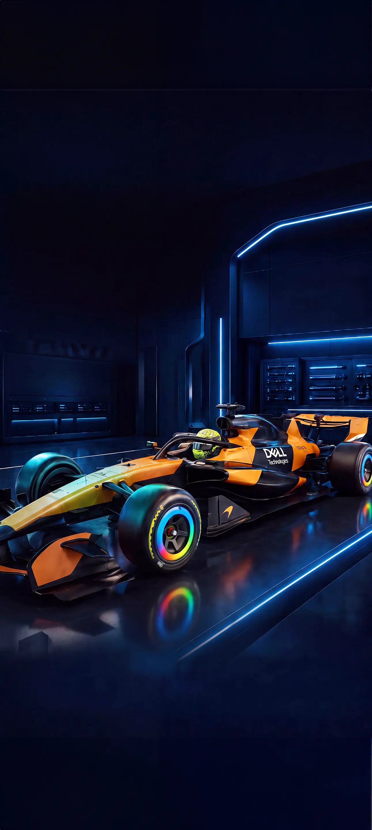 A Formula 1 car in a dark garage, lit from behind with blue light.